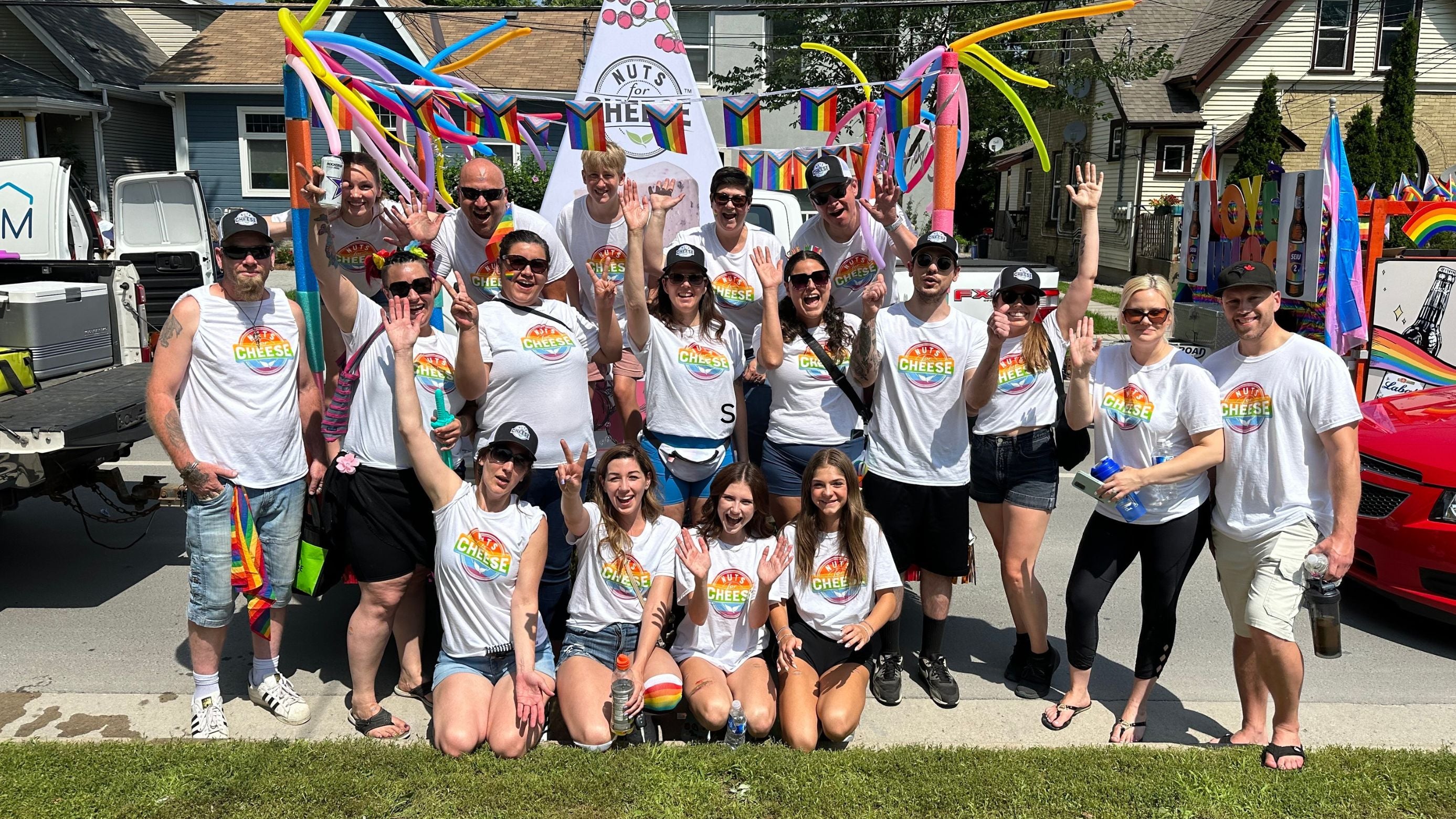 Nuts For Cheese team celebrating at the pride parade