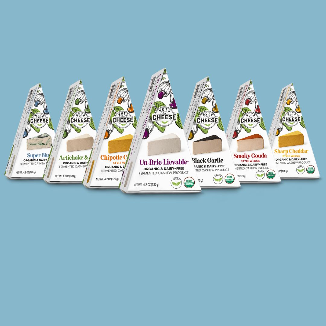 Nuts For Cheese™ collection of dairy-free cheese products on a blue background