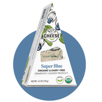 Nuts For Cheese™ Organic & dairy-free fermented Super Blue cheese wedge package on a blue circle background