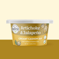 Container of Nuts For Cheese Artichoke & Jalapeño Creamy Cashew Dip on a yellow background.
