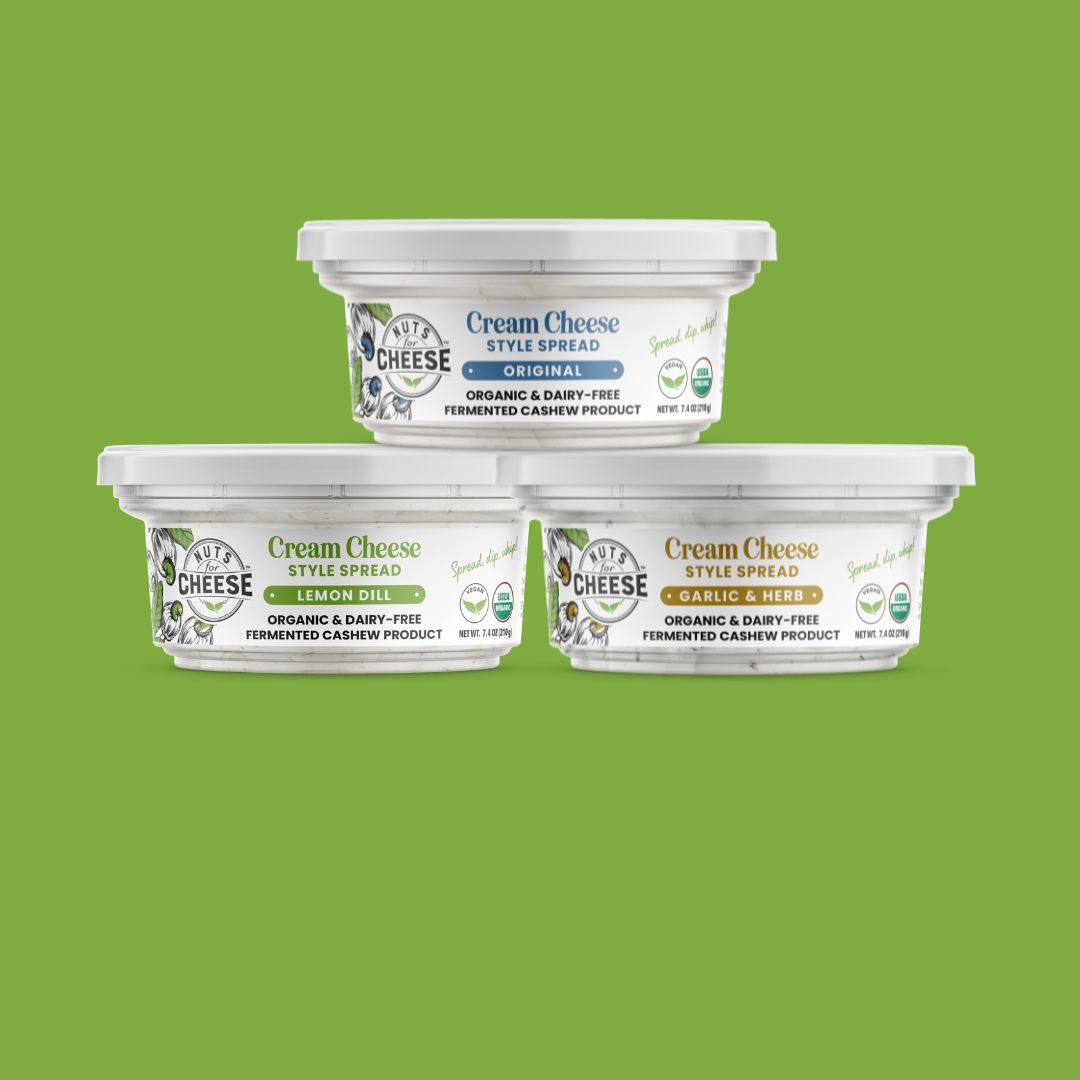 Nuts For Cream Cheese™ collection of plant-based cream cheese products on a green background