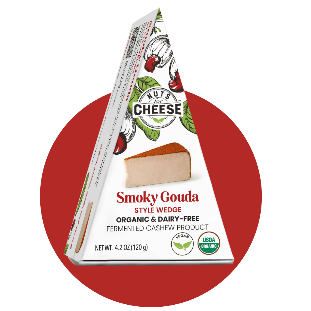 Nuts For Cheese™ Organic & dairy-free fermented Smoky Gouda cheese wedge package on a red circle background