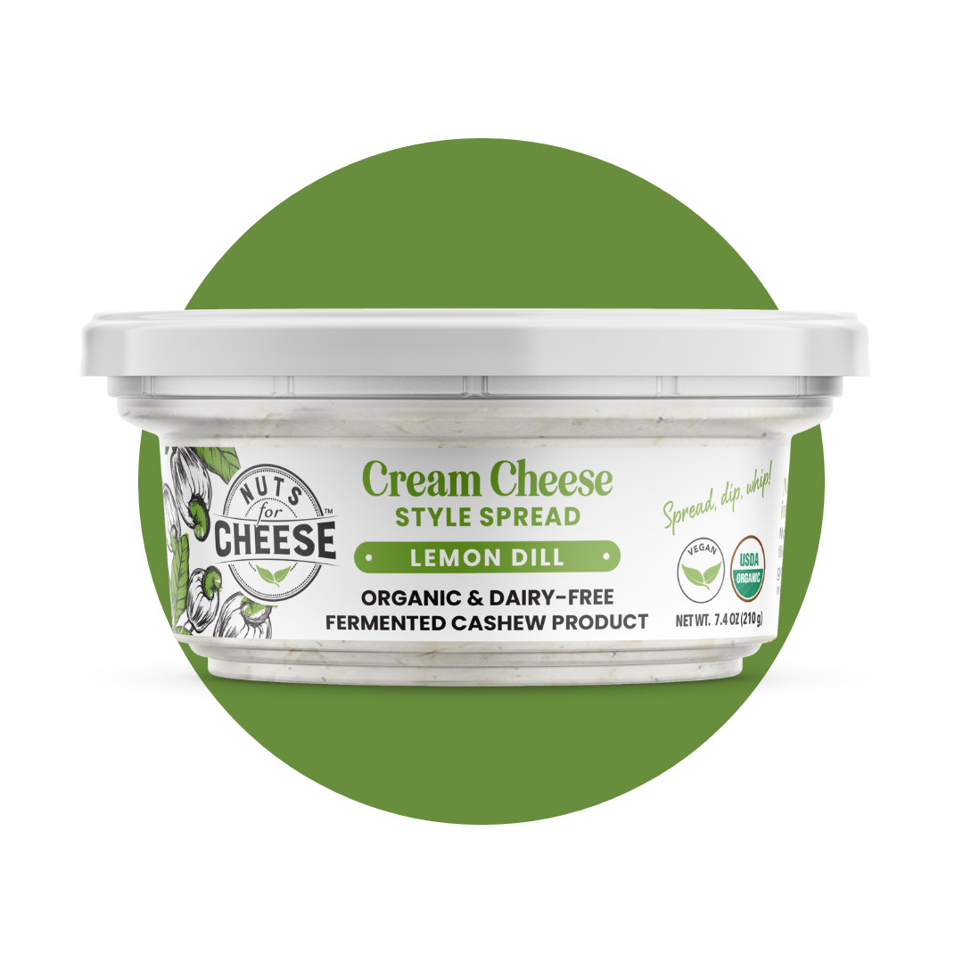 Nuts For Cream Cheese™ Organic & dairy-free fermented Lemon Dill cream cheese package on a green circle background